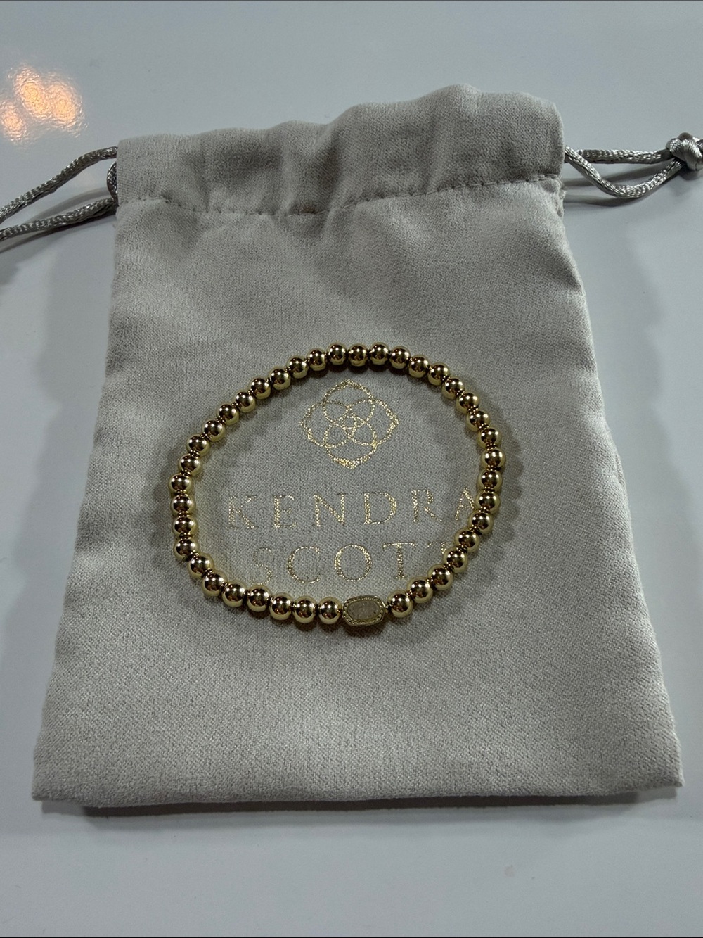 Kendra Scott Gold Beaded white pendant bracelet